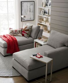 a living room with two couches and a coffee table