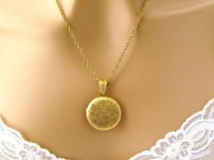 Locket Necklace, Gold Round Locket Necklace, Etched Photo Picture Necklace Floral, Mothers Day Gift Jewelry Christmas Birthday Gift Holds two 20 mm photos - Beautiful gold round locket etched with flowers and swirls holds 2 precious photos close to her heart. This timeless treasure will make a lovely gift for weddings, anniversary, Mothers Day, birthdays and other special occasions. This beautiful Art Nouveau/Victorian locket will become her go-to necklace for everyday wear. Length: 18 inches Lo Elegant Birthday Locket Jewelry, Valentine's Day Round Locket Necklace, Locket Necklaces As Gift, Round Locket Necklaces As Gifts, Personalized Gold Locket Necklace For Birthday, Round Locket Jewelry As A Gift, Valentine's Day Gift Round Locket Necklace, Round Locket Jewelry For Birthday, Round Locket Necklace For Birthday Gift