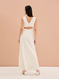 Marilyn is an elegant silhouette with an edge. The peek-a-boo back detail means that she makes a statement from behind whilst remaining bra-friendly. Designed in shimmery ivory crafted from 100% recycled polyester, Marilyn is the perfect dress for all your engagement or bridal activities or simply when you feel like keeping it paired-back in chic in tonal white. Marilyn Dress, Affordable Clothes, Holiday Dresses, British Indian, Ethiopia, Denim Top, Perfect Dress, Occasion Wear, Work Wear