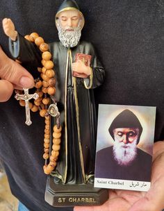 St. Charbel Makhlouf Youssef Antoun Resin Statue Maronite Catholic Monk icon 20 cm,+ rosary high+free gift card  May 8, 1828 - December 24, 1898 was a Maronite monk and priest from Lebanon. During his life he obtained a wide reputation for holiness and he has been canonized by the Catholic Church.  Many Maronite Christians have prayer cloths blessed and then place them on the sick, praying to God through the intercession of Saint Charbel, for healing Saint Charbel, St Charbel, Resin Statue, Free Gift Card, December 24th, Praying To God, Handmade Gift Wrap, Free Gift Cards, Olive Wood