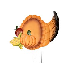 there is a fake turkey and corn on the cob