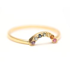 Adorable very dainty 14k yellow gold rainbow sapphire ring. Rainbow arch measures 1 cm wide, ring size 7. Would be cute in a stack as a ring guard. Sizing availableLayaway available Rainbow Gemstone Accented Ring, Elegant Rainbow Sapphire Gemstone Ring, Rainbow Sapphire Jewelry, 14k Gold Rainbow Rings With Multi-stone, 14k Gold Multi-stone Rainbow Jewelry, Rainbow Arch, Rainbow Ring, Watch Cufflinks, Ring Guard