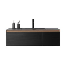 a black sink sitting on top of a wooden counter