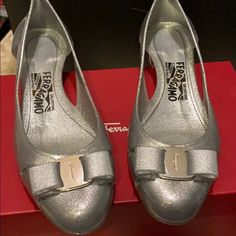 Brand New With Box And Dust Bag. Silver Glitter Jelly Pump With Bow Detail. Slip On Style With Cutout Sides. Approx 1in Metal Heels. Size 8c Made In Italy. Final Sale (Currently Avail At Neiman Marcus And Bloomingdales For $350 Plus Tax) Formal Glitter Leather Heels, Metal Heels, Bag Silver, Bow Detail, Silver Glitter, Salvatore Ferragamo, Shoes Women Heels, Neiman Marcus, Jelly