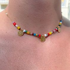 Three gold plated Coins add golden rays to these multi-color bright Pony Beads and tiny fresh water Pearls as accents, this Choker is a Summer must have. Perfect for everyday, at home or at the beach, this piece will bring cheer and joy! Th e Choker in the picture is 14” in length with 1” extender. We can also make the Choker 16" or 18", please let us know in the "comments" section at checkout. Chain and clasp 14Kt Gold Filled. P.S. Each color pattern will be different depending on the availability of colored beads. Gold Coin Choker, Coin Choker, Colorful Necklace, Brighter Days, Jewelry Lookbook, Water Pearls, Pony Beads, Colourful Necklace, Evil Eye Jewelry