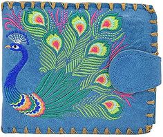 a blue wallet with a colorful peacock on it