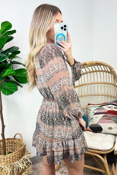 Details: Treat yourself to a little something special with this Lerissa Boho Print Dress. Fit for any occasion, the dress features a brown border with crochet trims and a ruffled hem (so you can really flounce!). - Boho print - Drawstring waist Content: 100% Polyester Lining: 100% RayonSize + Fit: Models are 5'4" and wearing a Small - Measurements from a size small - Full length: 32.5"- Chest: 38"- Waist: 25"-30"- Sleeves: 24"Brand: Olivaceous Bohemian Beige Mini Dress With Ruffle Hem, Brown V-neck Mini Dress With Ruffle Hem, Spring Mini Dress With Ruffle Hem In Brown, Spring Brown Mini Dress With Ruffle Hem, Brown Tiered Ruffle Dress, Brown Mini Dress With Ruffle Hem For Fall, Brown Tiered Dress With Ruffles, Brown V-neck Dress With Lace Trim, Casual Brown Dress With Lace Trim