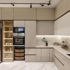 a modern kitchen with marble counter tops and white cabinets, along with open shelving