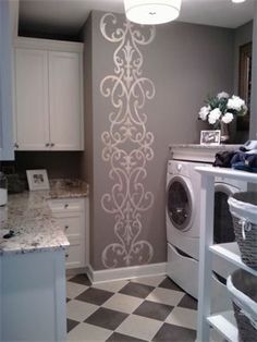 a washer and dryer in a small room