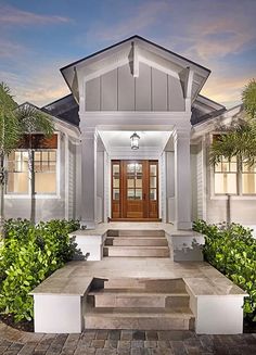 a house with steps leading up to the front door