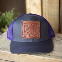 These are so much fun! There's just something about leather that draws you in and this quality leather evokes a sense of durability and timeless style. This full-grain leather patch trucker hat can be worn any season and with any outfit. It is the perfect way to keep the desert heat off your head while hiking and in turn, you are supporting our locally handcrafted leather business, located in Ivins Utah. . These leather hat patches have been hand-stamped into full-grain Wickett & Craig leath Rugged Outdoor Hat With Leather Patch, Casual Brown Leather Trucker Hat, Outdoor Leather Baseball Cap With Leather Patch, Rugged Leather Hat With Patch, Rugged Leather Hat With Leather Patch, Leather Baseball Cap For Outdoor Activities, Adjustable Trucker Hat With Leather Patch And Flat Bill, Adjustable Trucker Hat With Leather Backing And Curved Brim, Leather Flat Brim Baseball Cap For Outdoor