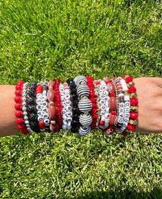 Georgia game day bracelet stack. 5 bracelet strands included in one stack. Multi material beads on elastic cord. One size fits all. Prices are based on bead material and size. Georgia Game Day, Georgia Dawgs, Bracelet Stacks, Gameday Outfit, Bracelets Handmade Beaded, Savannah Ga, Beaded Material, Cute Bracelets, Bracelet Stack