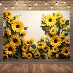 sunflowers painted on a brick wall with string lights