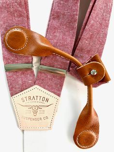 Full Set of Stratton Suspenders in Bandera Red Linen Paired with Your Choice of Pontedero Veg-Tan, Italian Leather Stratton Suspender Company has bridged this gap between the timeless look of traditional button-on braces without the hassle of tailoring. Stratton Suspender Co. uses a Patent Pending “Modular Twin-Magnetic Clasp System” to give the user the look of traditional button-on suspenders with the convenience of clips; yet with a comfort and versatility unmatched in history. The magnets ar Classic Fitted Belts And Suspenders With Adjustable Straps, Classic Adjustable Belts And Suspenders For Summer, Vintage Belts And Suspenders With Adjustable Straps, Red Suspenders, Derby Outfits, Leather Suspenders, Suspenders Set, Magnetic Clasp, Suspenders