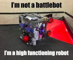 an image of a robot that is on the ground with captioning below it