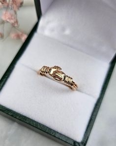 Fede vintage promise ring in 18 carat rose gold composed of three movable rings. The two hands clasped together reveal a heart once the rings are unfolded. These sentiment rings were offered to seal and promise a union. Weight: 3.15 gr Hallmarks present Size 50 - US size 5.25 (Cannot be resized) Slight marks due to friction of the rings. Delivered with invoice certificate. Sent in tracked and secure parcel. Do not hesitate to contact the store if necessary! Shop link: https://www.etsy.com/fr/sho Classic Rings With Spring Ring Clasp For Gifts, Gold Promise Ring With Detail, Heirloom Style Rose Gold Stackable Promise Rings, Heirloom Rose Gold Stackable Promise Rings, Anniversary Yellow Gold Rings With Spring Ring Clasp, Hallmarked Rose Gold Jewelry For Promise, Rose Gold Heirloom Promise Ring, Heirloom Rose Gold Stackable Rings As Gift, Hallmarked Rose Gold Promise Ring