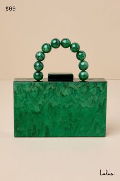 The Lulus Exclusive Energy Green Marble Acrylic Box Clutch has that special something that will make everyone fawn over your 'fit! This acrylic clutch features a mesmerizing marble design that shapes a hard case silhouette, a matching beaded top handle, and top clasp closure. The interior features accordion sides and a removable gold chain strap. Lined. Bag Measures 7" Wide, 4" Tall, 2. 5" Deep. Chain Strap Has A 23. 5" Drop. 100% Acrylic. Imported. Lulus | Exclusive Energy Green Marble Acrylic Acrylic Box Clutch, Wedding Clutch Purse, Acrylic Clutch, Bags Style, Clutches For Women, Wedding Clutch, Pearl Bag, Evening Handbag, Beaded Clutch