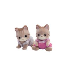 two small stuffed animals sitting next to each other