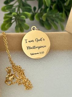 A beautiful disc gold necklace engraved with "I am God's Masterpiece". Necklace is 18" adjustable 16K Gold Plated Dainty chain. Great women's gift, Baptism, affirmation, motivational. Charms are gold plated over stainless steel. Plated jewelry is a wonderful, affordable way to add a sophisticated look to your wardrobe, with the look of real gold. It is also an excellent choice for people with sensitive skin. CARE TIPS: Avoid contact with perfumes, body oils, and other chemicals, including househ Gold Personalized Spiritual Charm Necklaces, Gift Medallion Coin Necklace With Adjustable Chain, Inspirational Gold Jewelry Gift For Her, Personalized Spiritual Medallion Necklace For Gifts, Inspirational Gold Jewelry As Gift For Her, Spiritual Coin Necklace With Adjustable Chain, Spiritual Coin Necklace With Adjustable Chain As Gift, Personalized Gold Stainless Steel Charm Necklaces, Adjustable Chain Coin Necklace Gift