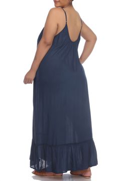 This effortless maxi dress features a ruffle hem and scoop back side for flowy, laid-back style. 52" length (size 1X) Square neck Sleeveless Unlined 100% rayon Hand wash, line dry Imported Model stats: 5'10" height, 32" bust, 25" waist, 36" hip. Model is wearing size 1X. Blue Bohemian Sleeveless Smocked Dress, Flowy Mid-length Rayon Maxi Dress, Blue Sleeveless Hippie Maxi Dress, Blue Bohemian Non-stretch Midi Dress, Blue V-neck Rayon Maxi Dress, Spaghetti Strap Maxi Dress, Laid Back Style, Ruffle Hem, Halter Dress