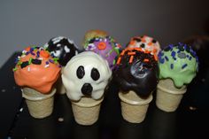 there are six ice cream cones with sprinkles and panda faces on them