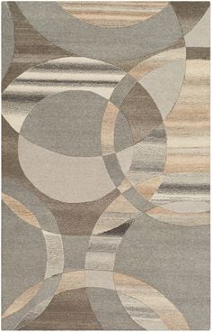 an area rug with circles and shapes in grey, beige and brown colors on the floor