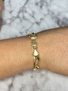 "-14K Mens FIGARO link Bracelet -Available in a 7.5\" -Width is 10.5mm -Lobster claw clasp -Solid 14K -Comfortable for daily wear -Nice statement piece -(Message us if you have any questions)" Gold Chain Link Bracelet With Clasp, 14k Gold Oval Link Jewelry With Box Clasp, Tarnish Resistant 14k Gold Cuban Link Bracelet, Gold Oval Link Bracelets With Clasp, 14k Gold Cuban Link Bracelet With Oval Links, 14k Gold Chain Link Bracelets With Polished Finish, 14k Gold Polished Finish Cuban Link Bracelet, 14k Gold Cuban Link Bracelet With Polished Finish, Chain Link Bracelet