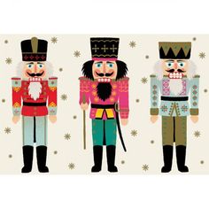 three nutcrackers are standing next to each other