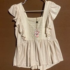 Beautiful Cream Sleeveless Top With Ruffles Nwt! Size M Casual Beige Vest Top, Casual Ruffled Tank Top For The Beach, Casual Beige Tank Top For Day Out, Casual Ruffled Tank Top, Casual Ruffle Tank Top, Casual White Ruffled Tank Top, Top With Ruffles, Ruffles, Sleeveless Top