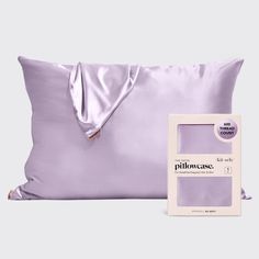 the pillow case is next to it's box and its contents are in lavender