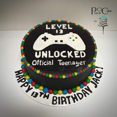 a birthday cake with a video game controller on it