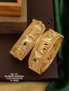 Description :- Gold Bangles/Indian Bangles/Antique gold Kada/floral bangles/temple jewelry/Amrapali bangles/ bangles/south indian jewelry Gift yourself a royal look with this perfectly crafted necklace set from Manalisstudio. Crafted with high quality stones and pearls, it is impressive in design. The green enamel artwork adds perfect texture to the design. Perfect for weddings and festivities, this antique Chuda set should be put on with your favorite sari or lehenga. 100% Satisfaction. Long La Gold Dual-tone Chandbalis For Festivals, Dual-tone Gold Chandbalis For Festivals, Gold Chandbalis Temple Jewelry For Rituals, Gold Temple Jewelry Chandbalis For Rituals, Temple Jewelry Style Bangle For Festivals, Temple Jewelry Bangle For Festivals, Gold Chandbalis With Intricate Design For Rituals, Gold Bollywood Chandbalis For Rituals, Gold Kundan Bangle For Rituals