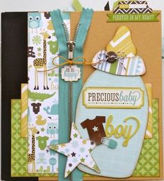 a close up of a card with an owl and star on the front, and a tag that says precious baby