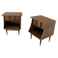 two wooden nightstands with one open drawer and the other closed shelf on each side