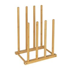 a wooden rack with six sticks in it on a white background, there is no image here to provide a caption for