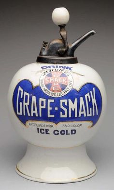 an ice cold beverage bottle with a pipe sticking out of it's top that says grape - smack