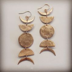 "These celestial earrings feature phases of the moon hand-formed out of golden-hued bronze. Great for every day or a night out under the moon, these are very versatile earrings. Total length is approximately 3\" including the ear wire(14k gold filled and lead free)" Bronze Earrings, Bronze Jewelry, Nature Inspired Jewelry, Moon Jewelry, Diamonds And Gold, Geometric Jewelry, Bijoux Diy, Brass Jewelry, Jewelry Inspo