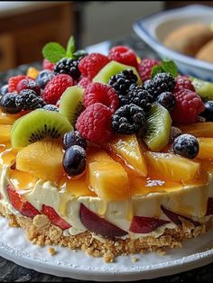 there is a cake with fruit on it