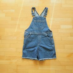 "Brand: Crazy Horse Liz Claiborne Size tag has been removed but these fit as a loose relaxed medium or more fitted large (waist is 36\" hips 40\") vintage 90's two back pockets with hook and loop closure Nice condition no flaws frayed leg hem perfect pair of short denim overalls 36\" waist 40\" hips 6\" inseam" Cutoff Cotton Overalls For Summer, Cotton Cutoff Overalls For Summer, Summer Cotton Cutoff Overalls, Casual Cutoff Shortalls With Pockets, Cotton Overalls With Frayed Hem, Casual Cotton Cutoff Shortalls, Summer Cotton Shortalls With Frayed Hem, Cotton Cutoff Shortalls With Pockets, Medium Wash Short Length Cotton Overalls