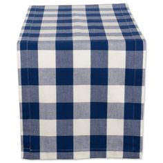 a blue and white checkered table runner