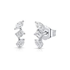 Experience the magic of 3 with Jo Nayor's Diamond Trifecta stud earrings. Each earring showcases a magnificent combination of marquis, pear, and Emerald cut white diamonds, elegantly set in solid 14K gold. With .19 CTS of diamonds in each piece, these earrings are the perfect balance of bold and sophisticated. Available individually or as a pair. Gold And Diamond Earrings, Diamond Tennis Necklace, Earrings Ear, Tennis Necklace, Ear Cuffs, Affordable Luxury, Link Necklace, White Diamonds, Stud Earring