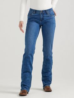 RIDING JEANS THAT NEVER QUIT Feel confident and comfortable in your riding clothes by giving yourself the best seat possible. Wrangler® women's Ultimate Riding Jeans are designed for fit, form, and function while on horseback, but they are bound to become your go-to jeans for working in the barn and running errands around town. Q-Baby women's jeans feature a mid-rise fit and no-gap waistband for full coverage when you're in the saddle as well as added stretch and flat seams for all-day comfort. Wrangler Riding Jeans, Laney Wilson, Riding Jeans, Riding Clothes, Never Quit, Baby Jeans, Womens Jeans Bootcut, On Horseback, Riding Outfit