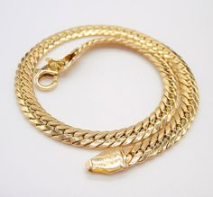 18k yellow gold cobra bracelet herringbone version 19.5 cm long 4 mm wide. Material: 750% 18 kt yellow gold Total Weight: 3.10 grams around Condition: New! Registered and insured Shipping Worldwide with carrier DHL, SDA, GLS, UPS, TNT, FedEx Dear visitor, for any questions or info or better 'proposal' of purchase, we are and I am always at your disposal! Many greetings from Italy! Lucio (collaborator of the Coa firm) Yellow Gold Snake Chain Bracelet, Flexible Yellow Gold Snake Chain Bracelet, Yellow Gold Plated Snake Chain Bracelet, Cobra Bracelet, Bones Bracelet, Italian Jewelry, Fish Bone, Chain Link Bracelet, Chain Link