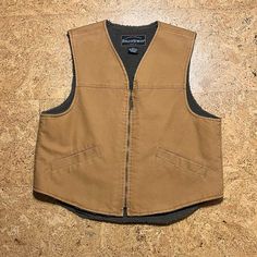 Field & Stream Men’s Workwear Cotton Canvas Faux Sherpa Lined Zip Closure Vest In Sz Large. New Without Tags. 2 Front Pockets. Carmel Tan Color. Great Condition Back Hem Is Flipping Just A Little.. But I Think That Is More How It Was Stored As It Is In New Condition. Brown Outerwear With Pockets For Outdoor Work, Brown Utility Vest For Fall, Winter Utility Vest For Outdoor Work, Brown Rugged Vest For Winter, Rugged Brown Winter Vest, Brown Rugged Winter Vest, Khaki Winter Work Vest, Khaki Winter Workwear Vest, Brown Fleece-lined Workwear Outerwear