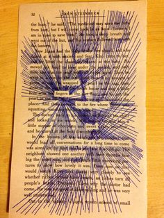 a piece of paper that has been drawn on top of some kind of book page