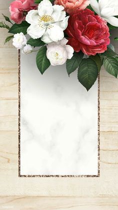 a white and red flower arrangement on a pink marble background with gold trimmings