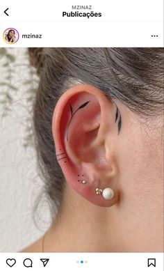 a woman with ear piercings on her ears