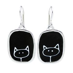 A simple white line drawing of a cute cat on black enamel!These sterling silver and enamel earrings measure about 3/4 of an inch tall and hang from solid sterling French ear wires.Each piece is cast in sterling silver, to which 3 layers of vitreous enamel are applied and fired. Finally, I apply and fire the custom screen prints made from my drawings. Adorable, durable, and unique!Look for the matching necklaces:https://www.etsy.com/listing/120633732/stick-kitty-and-love-kitty-reversiblehttps://w Nickel-free Black Enamel Jewelry, Black Enamel Nickel-free Earrings, Black Cat Jewelry, Glass Store, Custom Screen Printing, Vitreous Enamel, Cute Box, Cat Jewelry, Enamel Earrings