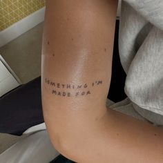 someone has their arm tattooed with the words something i'm made out on it