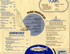 the menu for fresh vegetables is shown in blue and white colors, with an image of a sailboat on it